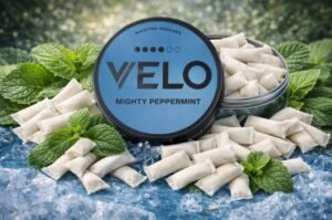 Open can showing slim all white portions of VELO Mighty Peppermint 17mg extra strong nicotine pouches
